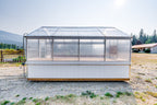 Side view of the Harvest greenhouse showing roll-up ventilation sides