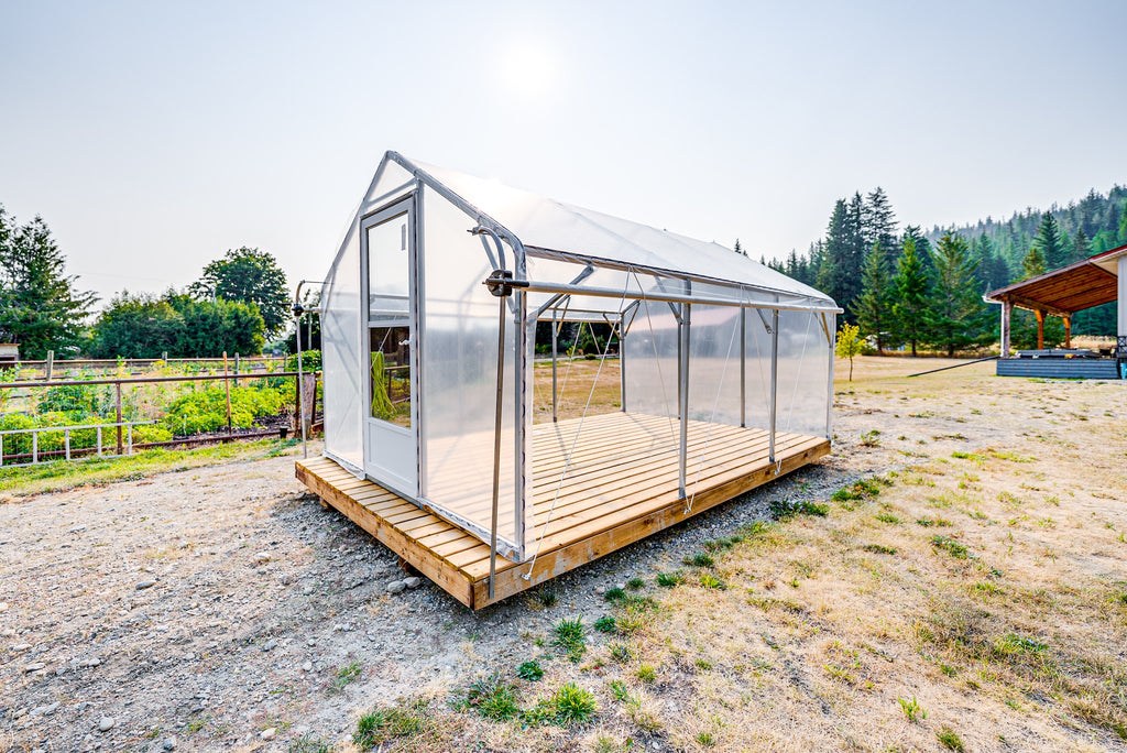 Sprout greenhouse from the front corner showing the plank deck