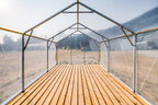 Inside the Sprout greenhouse looking toward the door, galvanized steel frame