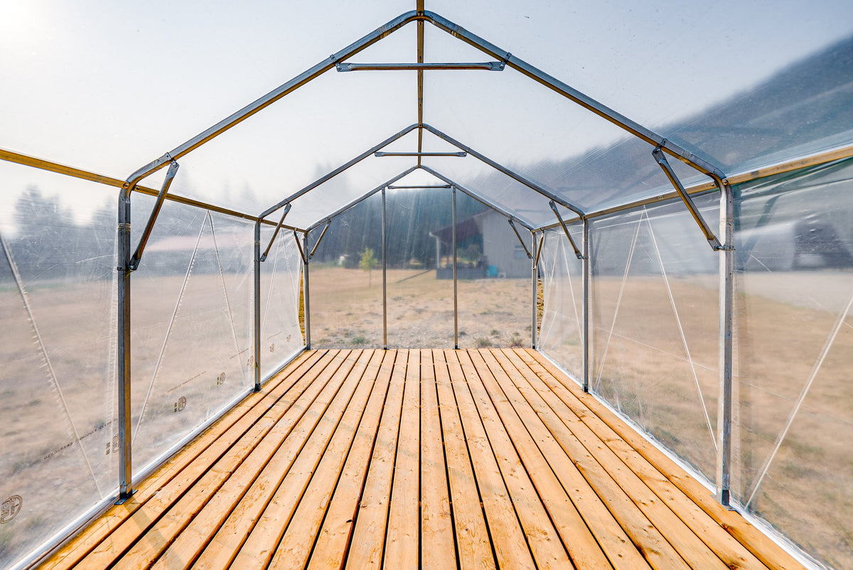 Inside the Sprout greenhouse looking toward the door, galvanized steel frame